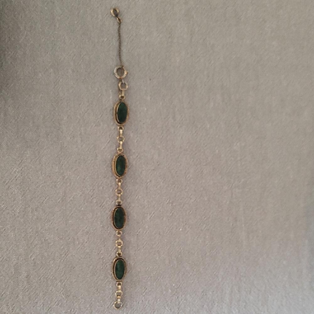 Elegant Gold and Green Bracelet